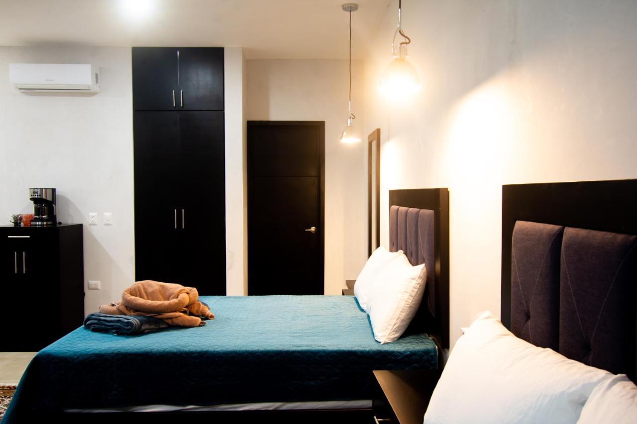 Hotel Casa Tortuga Tulum - Cenotes Park Inclusive מראה חיצוני תמונה A bedroom in a serviced apartment in Lagos, Nigeria